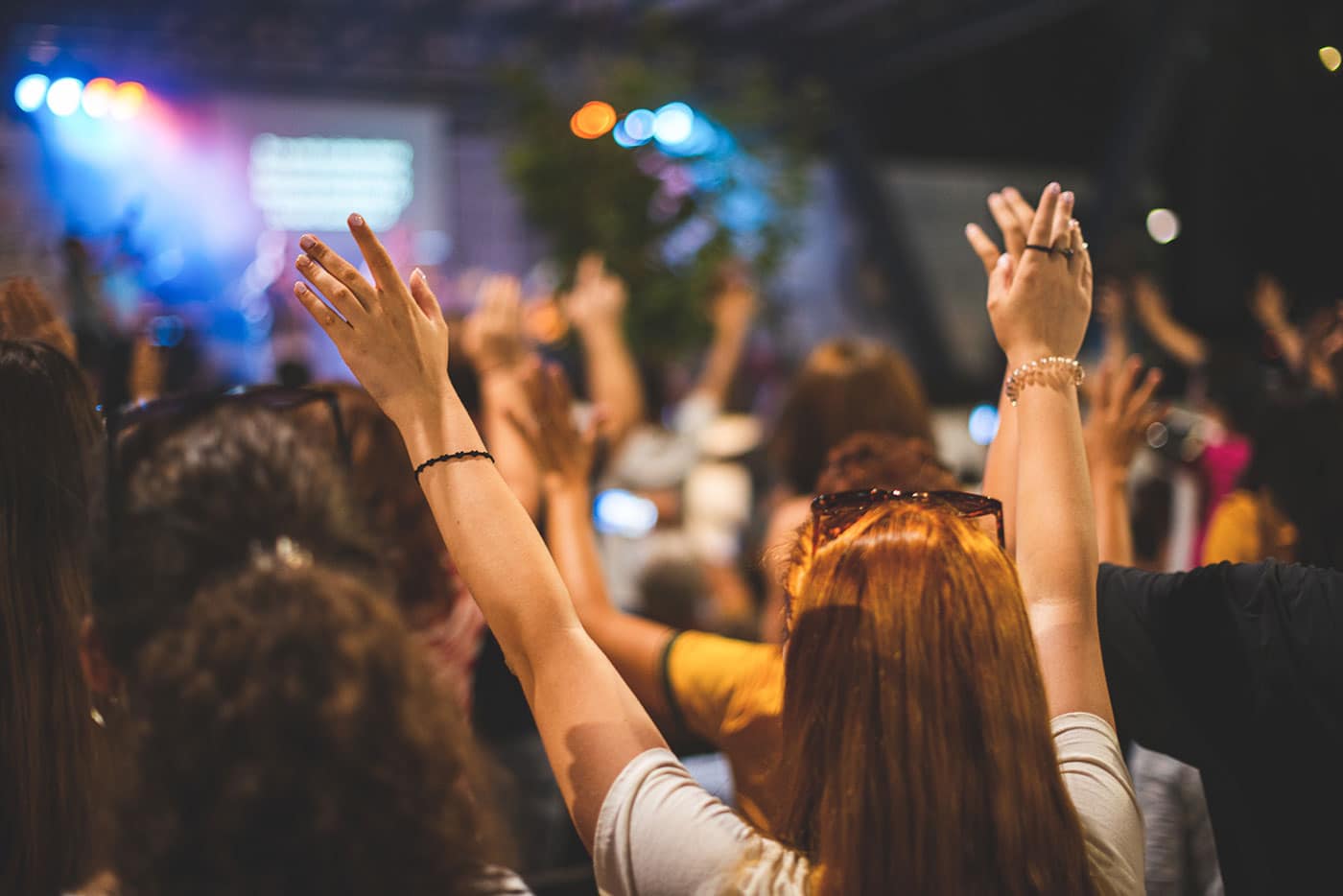 Hands raised during worship service